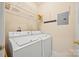 Laundry room with front loading washer and dryer at 7822 Village Harbor Dr, Cornelius, NC 28031