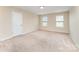 Inviting bedroom filled with natural light from two windows and neutral walls at 832 Summerlake Dr, Fort Mill, SC 29715