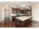 Bright, open kitchen featuring a center island, granite countertops, and stainless steel appliances at 832 Summerlake Dr, Fort Mill, SC 29715