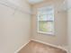 Walk-in closet with built-in shelving and window at 832 Summerlake Dr, Fort Mill, SC 29715