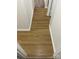 Hallway view showcasing wood-like flooring that extends to other rooms at 8322 Summerglen Cir, Charlotte, NC 28227
