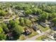 A charming neighborhood is displayed in this aerial shot with mature trees and well-maintained homes at 834 Murphy St, Kannapolis, NC 28081