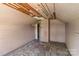 Attic with pink walls and patchwork flooring at 834 Murphy St, Kannapolis, NC 28081