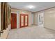 Bedroom with full size mirrored closet doors, medium toned walls, and access to a full bathroom at 834 Murphy St, Kannapolis, NC 28081