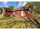 Cozy single-story brick home featuring a well-maintained lawn and mature shade trees in a quiet setting at 834 Murphy St, Kannapolis, NC 28081