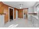 Open kitchen layout with access to laundry area at 834 Murphy St, Kannapolis, NC 28081