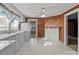 Traditional kitchen with vintage cabinets and a view to the backyard at 834 Murphy St, Kannapolis, NC 28081