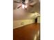 Cozy finished attic with hardwood floors, neutral walls, ceiling fan and storage at 9113 Oak Bluff Ct, Waxhaw, NC 28173