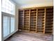 Bright office with custom built-in shelving and a large window at 9113 Oak Bluff Ct, Waxhaw, NC 28173
