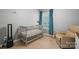 Comfortable bedroom featuring a crib, chair and window at 1097 Constitution Park Blvd, Rock Hill, SC 29732