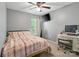 Bedroom with desk, fan, and window that bring in natural light at 1097 Constitution Park Blvd, Rock Hill, SC 29732