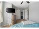 Light-filled bedroom with ceiling fan and closet at 1097 Constitution Park Blvd, Rock Hill, SC 29732