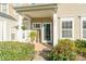 Inviting front porch with a welcome sign and lush plants at 1097 Constitution Park Blvd, Rock Hill, SC 29732