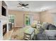 Inviting living room with fireplace, ceiling fan, and sliding door leading to the backyard at 1097 Constitution Park Blvd, Rock Hill, SC 29732