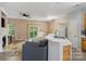 Open concept living room with fireplace and sliding doors to the outside at 1097 Constitution Park Blvd, Rock Hill, SC 29732