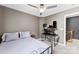 Bedroom featuring carpet, neutral walls, ceiling fan, and a workstation in the corner at 12319 Cumberland Cove Dr, Charlotte, NC 28273