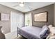Bedroom with neutral walls, carpet, a window, and closet with sliding doors at 12319 Cumberland Cove Dr, Charlotte, NC 28273