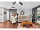 Inviting living room with modern furnishings, a cozy atmosphere, and wood floors at 12319 Cumberland Cove Dr, Charlotte, NC 28273