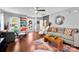 Bright living room features hardwood floors, stylish furnishings, and plenty of natural light at 12319 Cumberland Cove Dr, Charlotte, NC 28273
