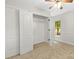 This bedroom includes carpet, a window with a view, and a closet at 13206 Meadowmere Rd, Huntersville, NC 28078