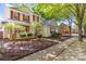 Charming two-story home with red shutters and lovely landscaping at 13206 Meadowmere Rd, Huntersville, NC 28078