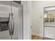 Stainless steel refrigerator with view of garage access at 13206 Meadowmere Rd, Huntersville, NC 28078