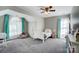 Bright bedroom with a comfortable bed and inviting natural light, perfect for relaxation at 15407 Saxon Trace Ct, Huntersville, NC 28078