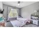 Bright bedroom with natural light, play area and cozy decor, creating an inviting space at 15407 Saxon Trace Ct, Huntersville, NC 28078