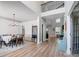 Open foyer with wood flooring, chandelier, and a view of the upper level at 15407 Saxon Trace Ct, Huntersville, NC 28078