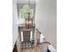 Two-story foyer with chandelier, hardwood floors, neutral paint, and lots of natural light at 15407 Saxon Trace Ct, Huntersville, NC 28078