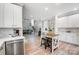 Open-concept kitchen featuring stainless steel appliances, breakfast bar, and lots of cabinet space. Perfect for entertaining at 15407 Saxon Trace Ct, Huntersville, NC 28078