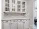 White kitchen with updated cabinets, drawers, hardware and subway tile backsplash at 15407 Saxon Trace Ct, Huntersville, NC 28078