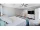 Main bedroom featuring neutral paint, a ceiling fan, and updated lighting at 15407 Saxon Trace Ct, Huntersville, NC 28078