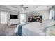 Main bedroom featuring a large closet, neutral paint and tray ceilings at 15407 Saxon Trace Ct, Huntersville, NC 28078