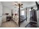 Charming bedroom featuring a four-poster bed, soft lighting, and classic decor for a cozy and sophisticated retreat at 15613 Troubadour Ln, Huntersville, NC 28078