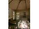 Patio featuring an umbrella-covered dining set and outdoor gas fireplace at 15613 Troubadour Ln, Huntersville, NC 28078