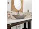 Unique bathroom with vessel sink, mosaic tile backsplash, and wooden framed mirror at 17546 Westmill Ln, Charlotte, NC 28277