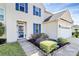 Traditional two story home with a two car garage, front yard, and blue shutters at 17546 Westmill Ln, Charlotte, NC 28277