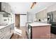 Modern kitchen featuring stainless steel appliances, a center island, and ample cabinet space at 17546 Westmill Ln, Charlotte, NC 28277