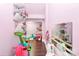 Pink play room with hardwood floors, ballet bar, mirror, and toy baskets at 17546 Westmill Ln, Charlotte, NC 28277