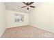 Bedroom featuring a ceiling fan and a window for natural light at 225 Carrie Ct, Concord, NC 28027