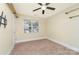 Bedroom featuring a ceiling fan and a window for natural light and TV mount at 225 Carrie Ct, Concord, NC 28027