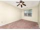 Neutral bedroom with carpet, a window, ceiling fan, and electrical outlets at 225 Carrie Ct, Concord, NC 28027