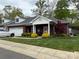 Charming single-story home with well-manicured lawn and inviting front porch at 227 Crystal Springs Ln, Shelby, NC 28150