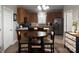 Inviting eat-in kitchen featuring stainless steel appliances and an island at 227 Crystal Springs Ln, Shelby, NC 28150