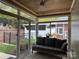 Cozy sunroom with lots of natural light, outdoor views and comfortable seating at 227 Crystal Springs Ln, Shelby, NC 28150