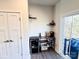 Stylish bar area with wine fridge, shelving, and counter space, ideal for entertaining guests at 2315 Doby Creek Ln # 77, Charlotte, NC 28262