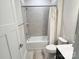 Clean bathroom featuring a tiled shower, neutral walls, a toilet, and a modern sink at 2315 Doby Creek Ln # 77, Charlotte, NC 28262