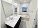 Bathroom with a double sink vanity and soaking tub at 2315 Doby Creek Ln # 77, Charlotte, NC 28262