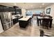 Open kitchen flows into the dining and living areas, perfect for entertaining and Gathering gatherings at 2315 Doby Creek Ln # 77, Charlotte, NC 28262